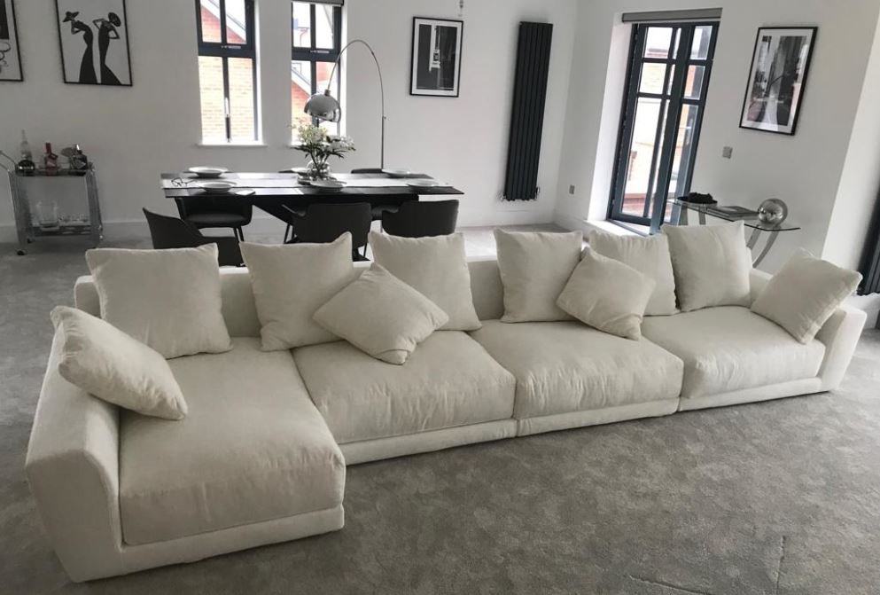 l shape sofa dividing room